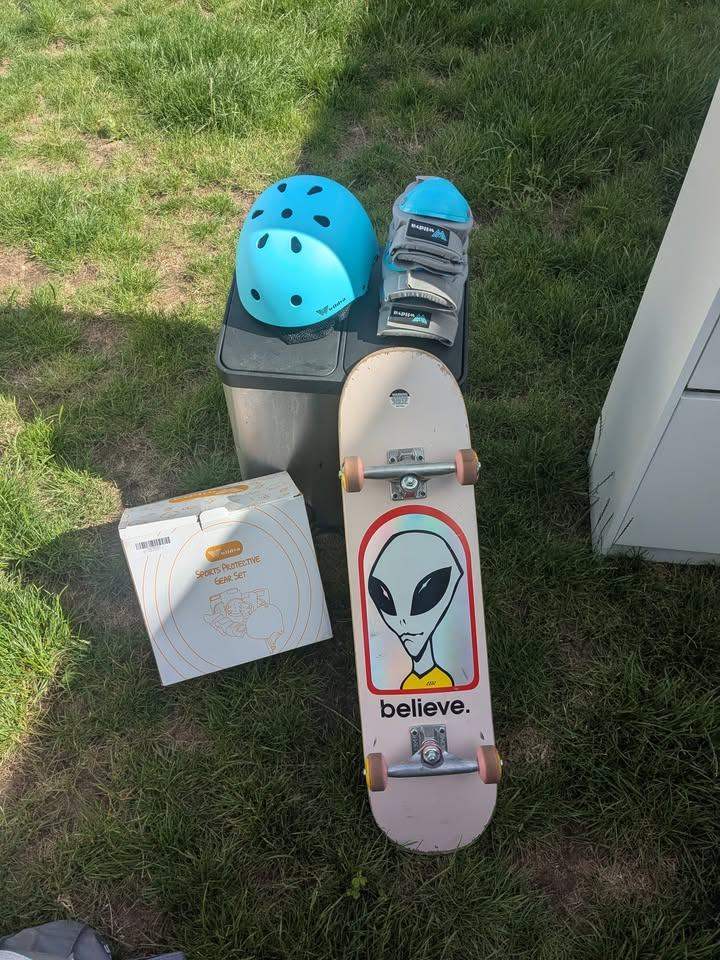 Alien workshop skateboard with protective gear