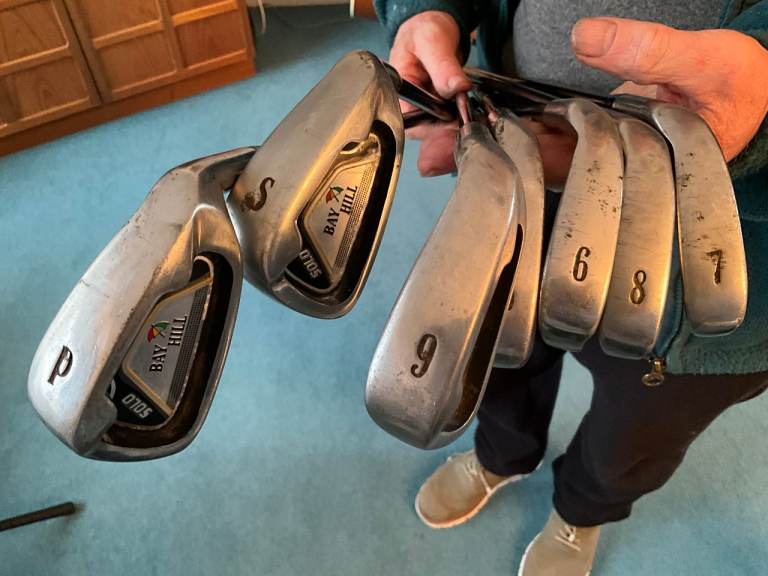 7 Bayhill irons with graphite shafts 5 iron to Sand iron suit a beginner