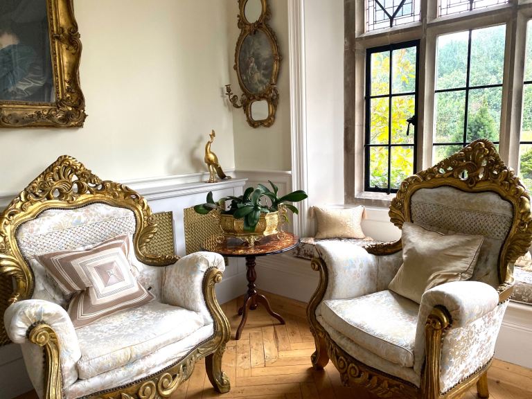 2 armchairs wide padded scroll arms ivory fabric 