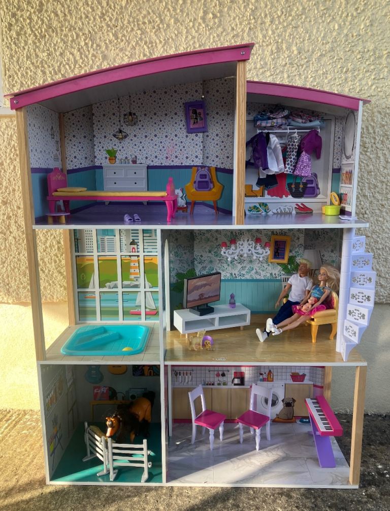 Barbie style dolls house with furniture and Barbie family