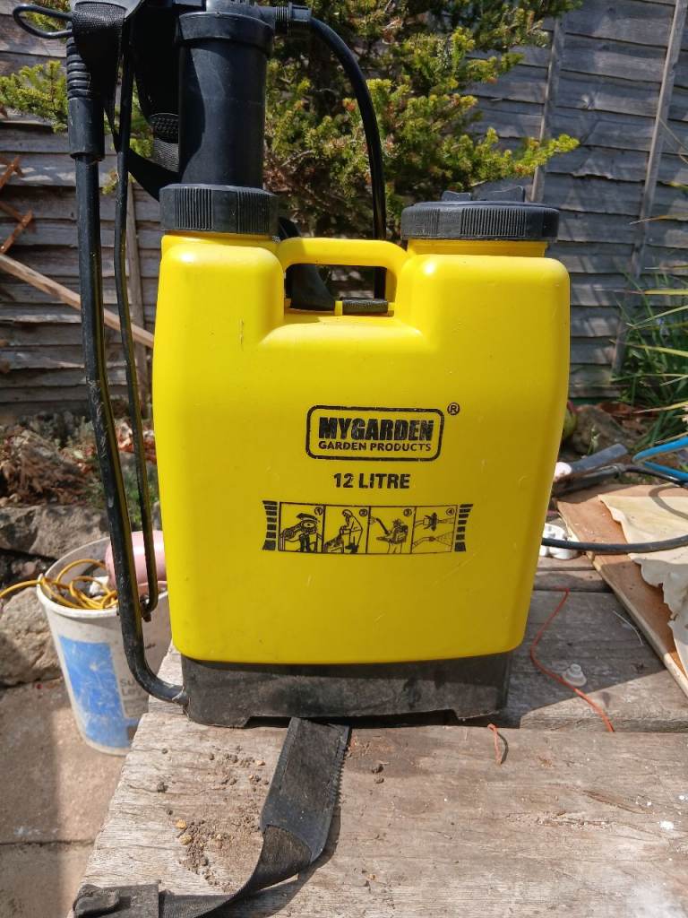 Yellow Garden Water Pump – Good Condition