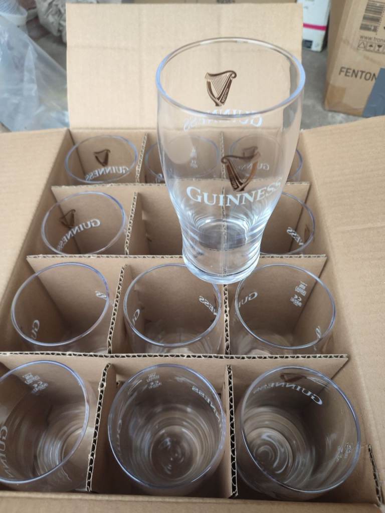 12 x new Guinness pint glasses 