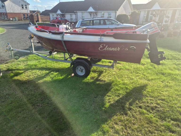  Small Fishing Boat with Outboard Motor and Trailer