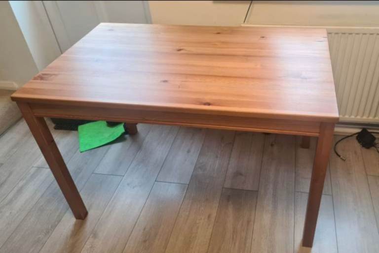 Sturdy Wooden Dining Table – Good Condition