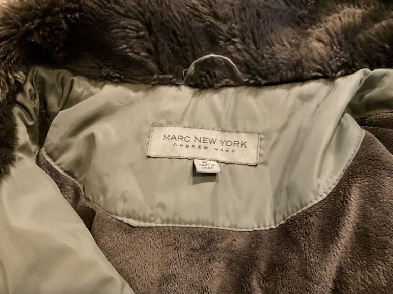 ANDREW MARK OF NEW YORK ladies coat size XL about 24 inches pit-pit when flat.