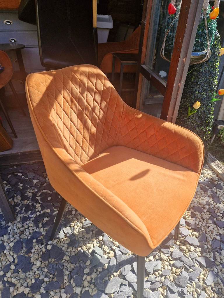 Four orange chairs 