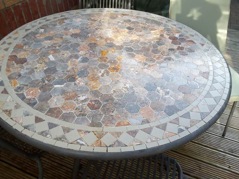 Patio table and 4 chairs with cushions