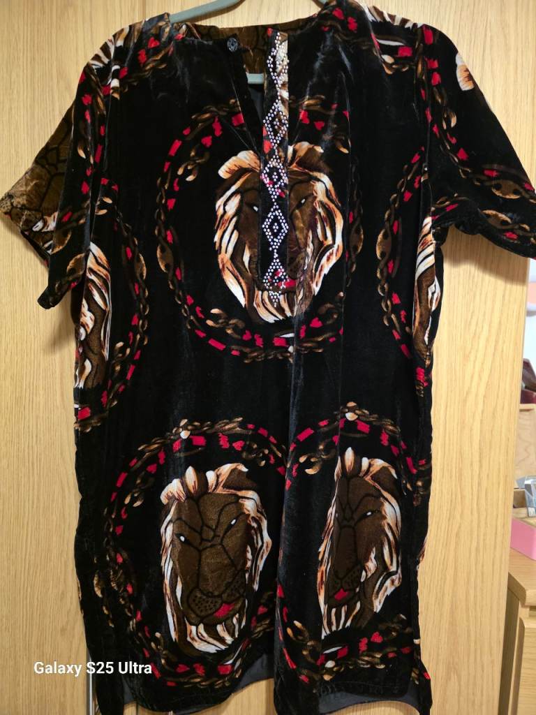 6 Handmade Nigerian Dresses tailored in Nigeria size large and one pair of sandals size 6. 