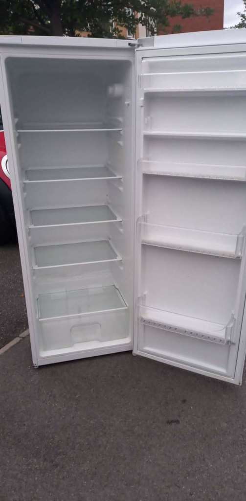  FRIDGE TALL , IN WHITE , local delivery is included , and other places 