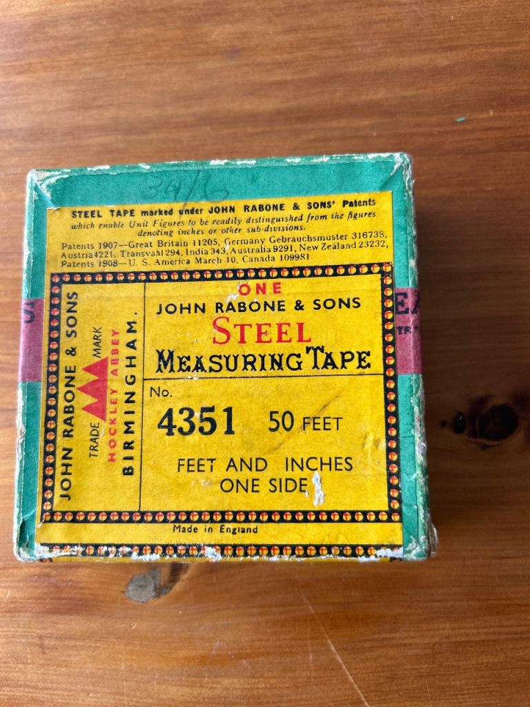 Boxed steel measuring tape
