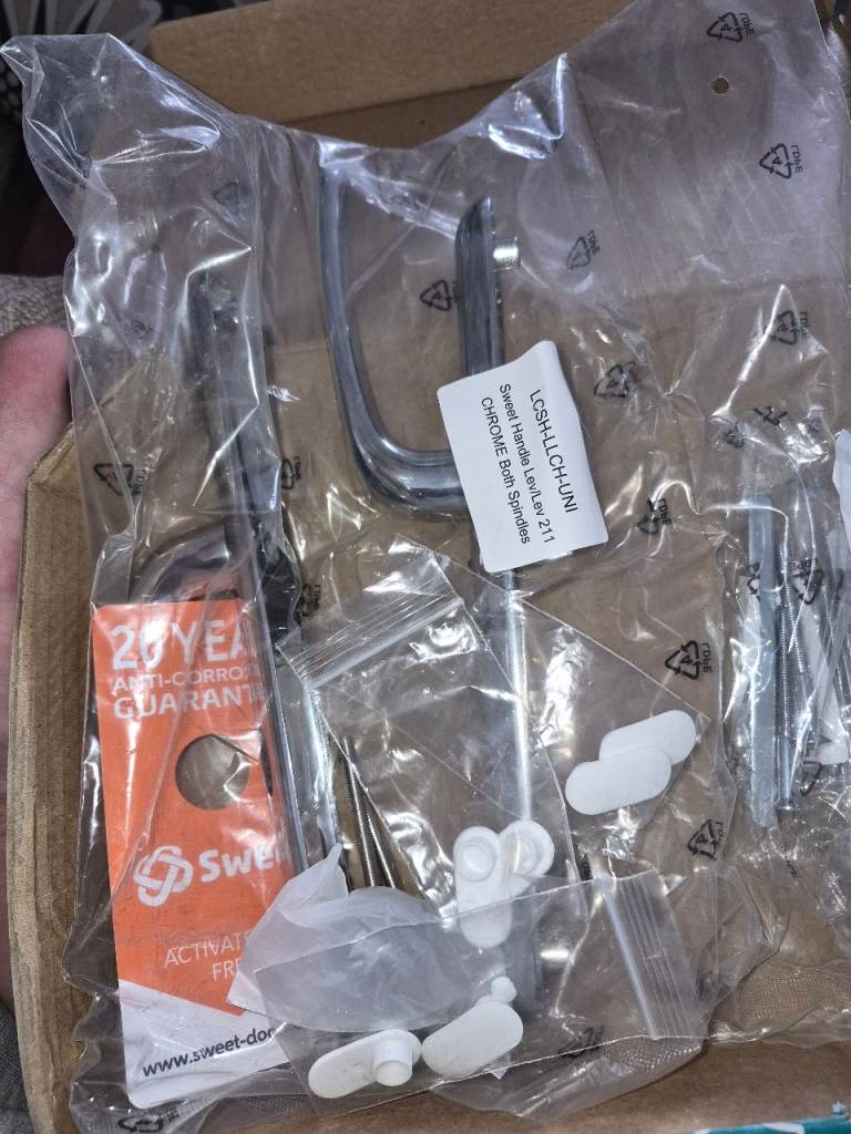 Brand new door handles with lock.