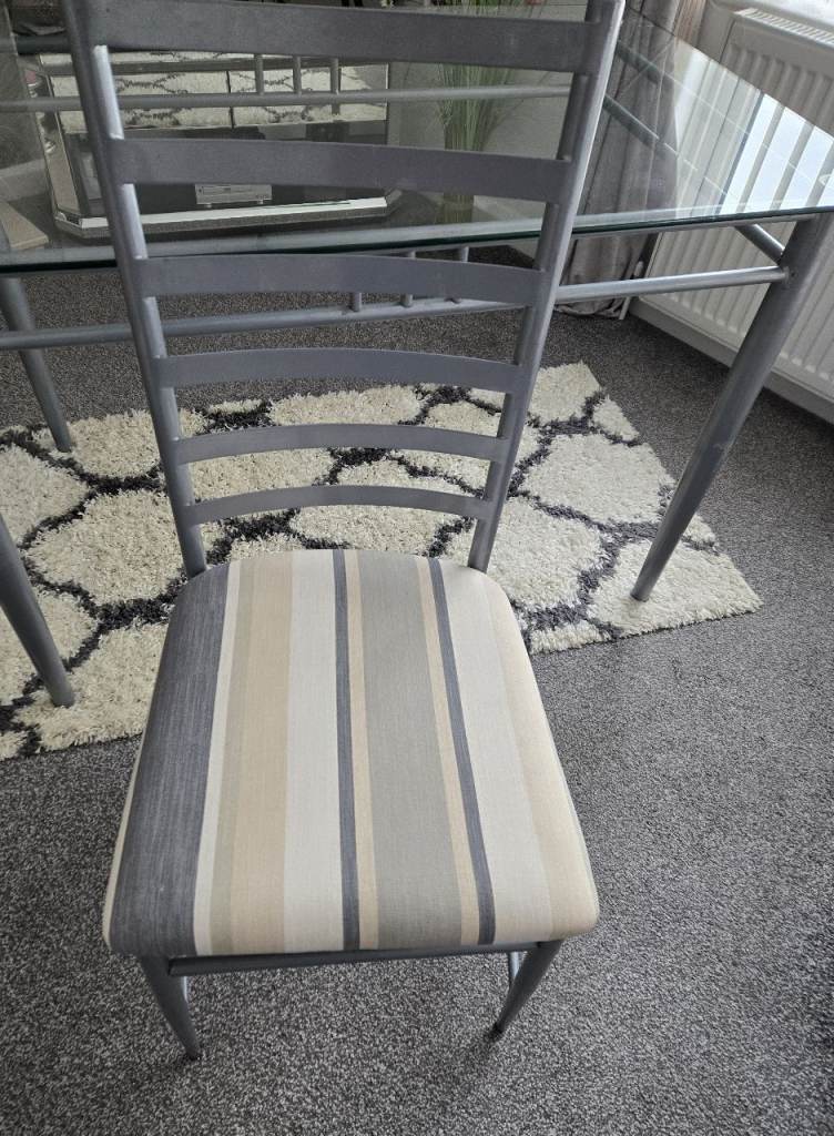 Glass table and four chairs | in Bulwell, Nottinghamshire | Gumtree