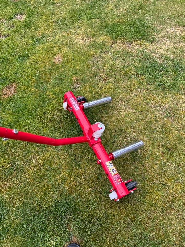 Wheel lifter for motor a vehicle