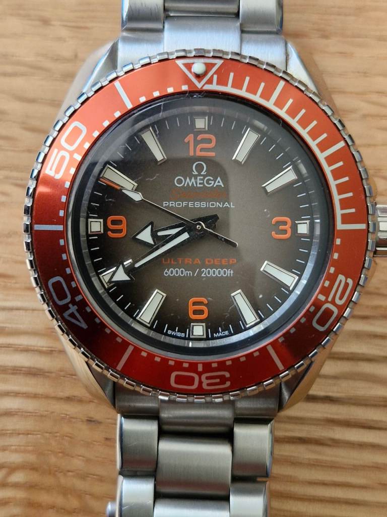 Omega Planet Ocean Ultra Deep Watch – Silver with Orange Bezel