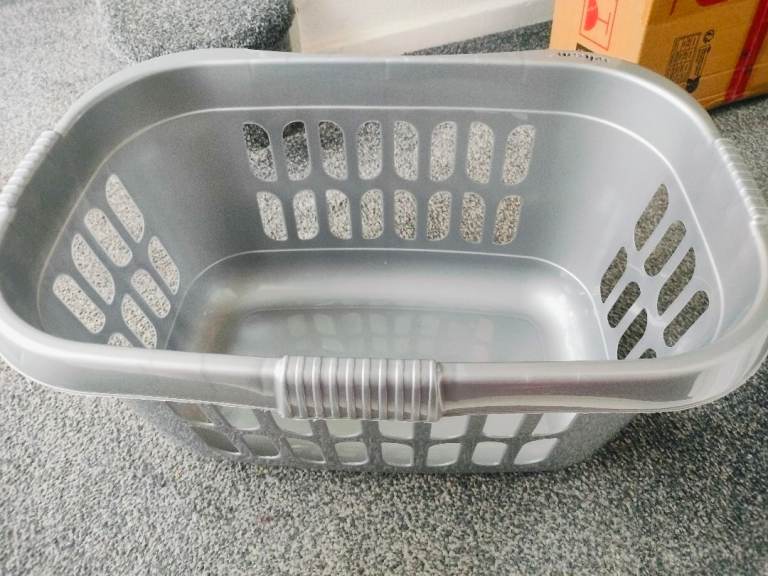 Grey laundry basket – like new.