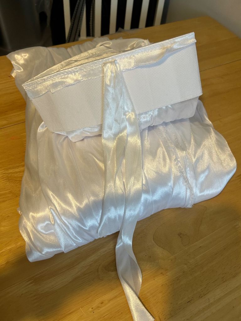 Photo backdrop with white silky sheet