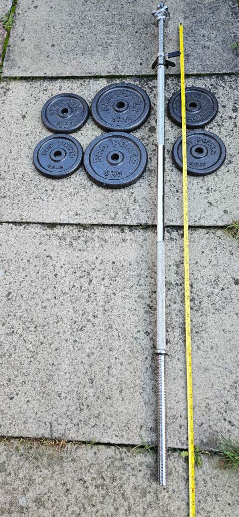 Cast Iron weights plus 5ft Bar