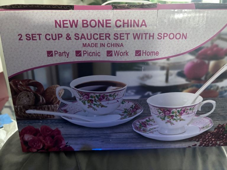Cups and saucer with spoons