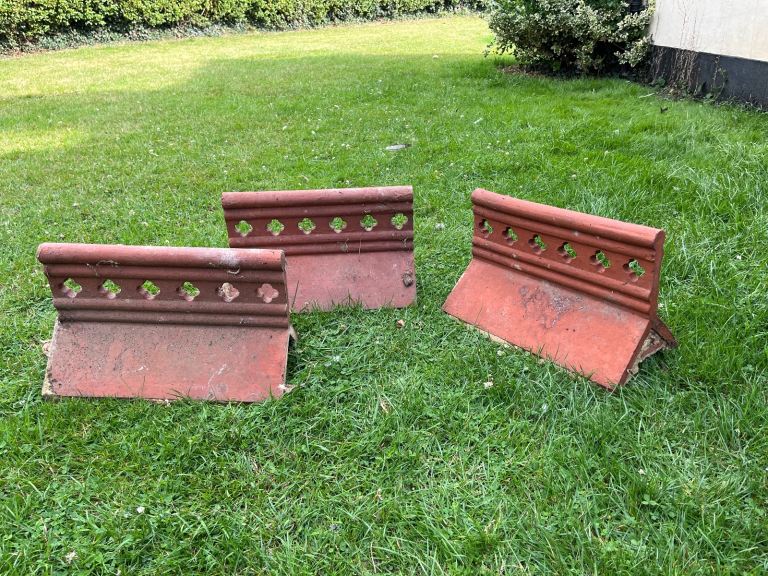 Three decorative ridge tiles 