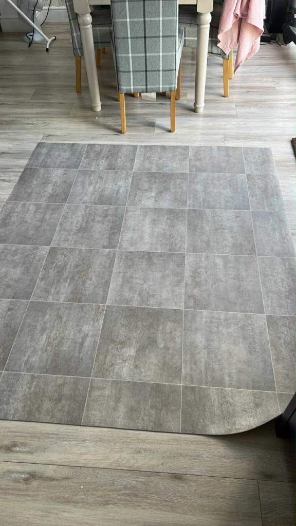 Grey tile affect vinyl flooring 
