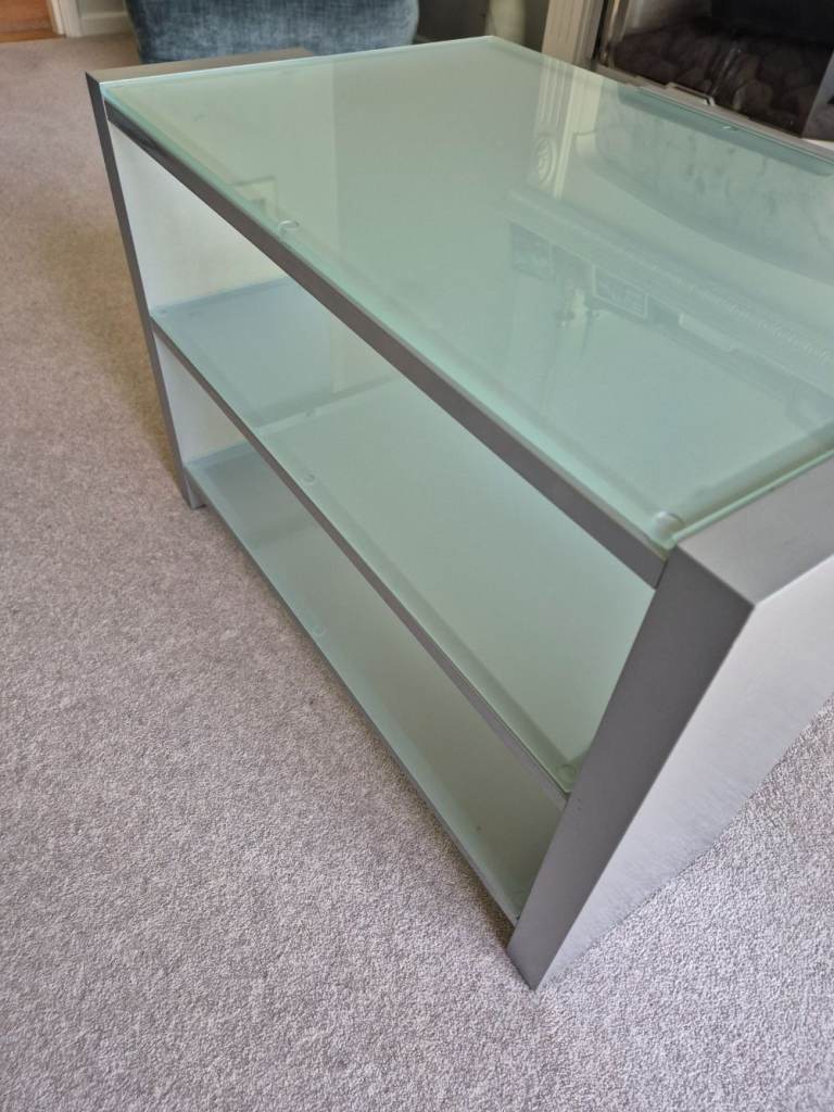 John Lewis frosted glass TV stand - approx dimensions are 67cm wide x 42cm deep x 46cm tall