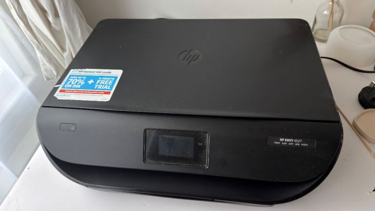 HP ENVY 4527 all-in-one printer with extra inks  