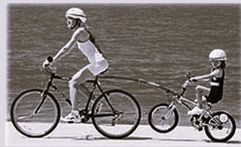 Trail Gator package, tow your childs bike behind adults bike, teach them how to ride!