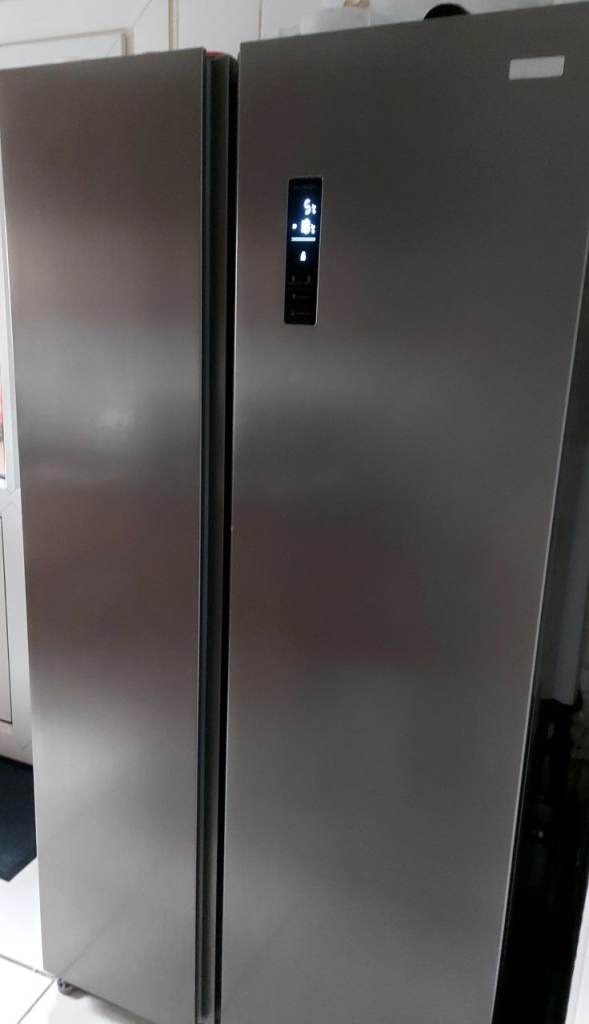 Double-door, large-size refrigerator with freezer.