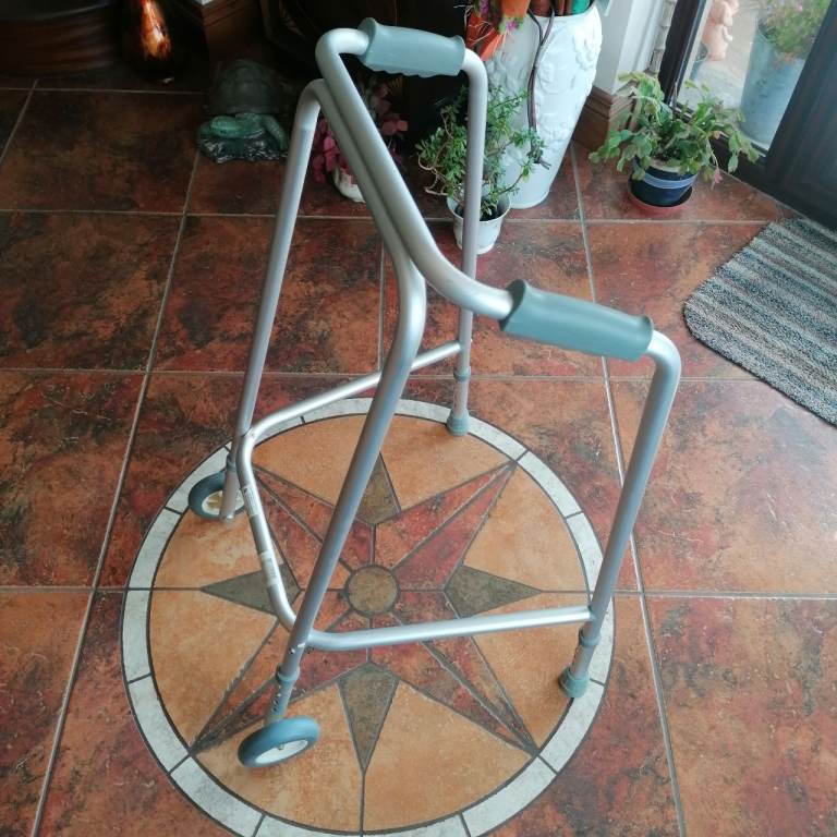 Walker frame with wheels