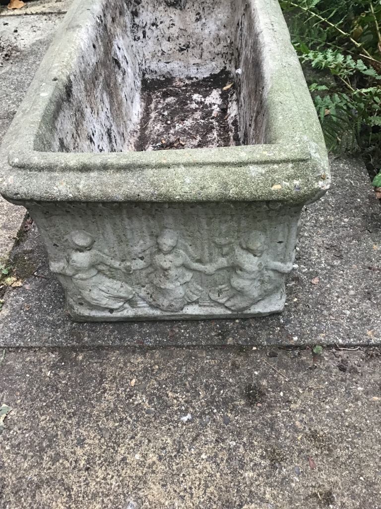 LARGE GARDEN TROUGH WITH DANCING FIGURES.