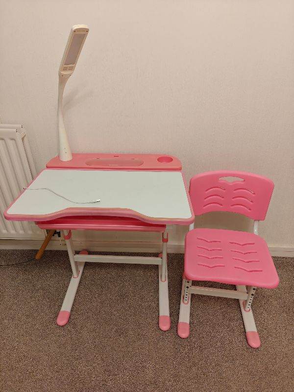 Height adjustable kids table and chair. 