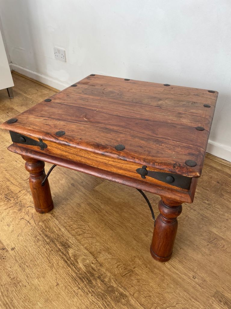 Solid Wood Coffee Table with Metal Accents – Good Condition