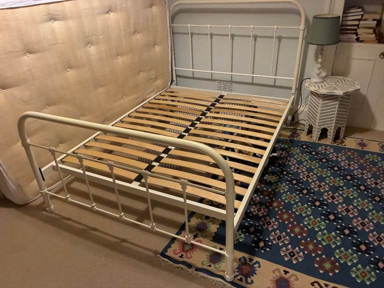 Cream metal double bedstead in good condition with double mattress