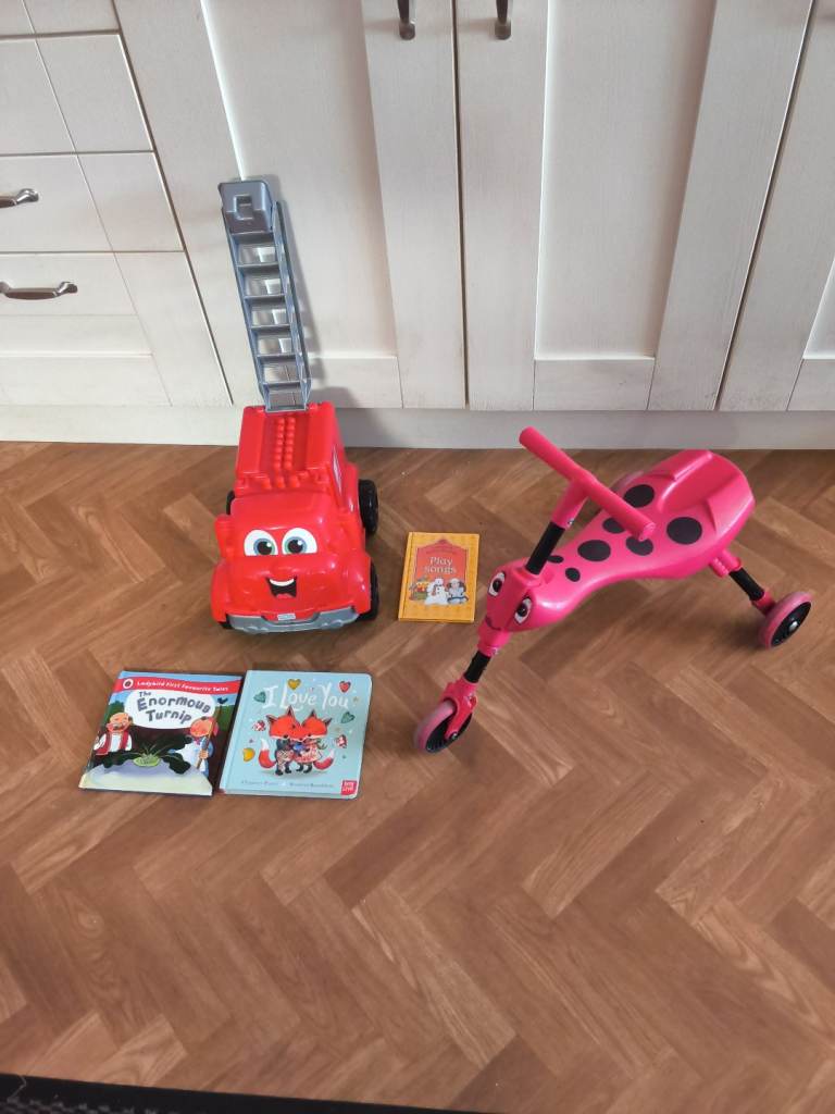Toddlers  scuttle  bug .large  fire engine and three books