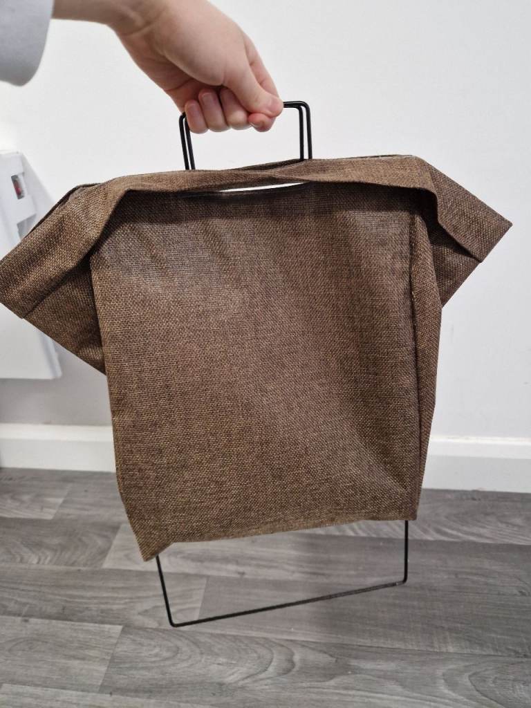 Lightweight laundry hamper, good for small spaces, chic brown & black design
