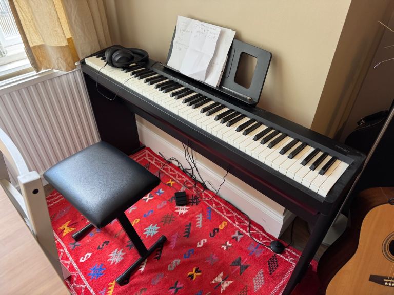 Great condition Roland FP-10 Digital Piano (88 Weighted Keys) + Stand + Sustain Pedal