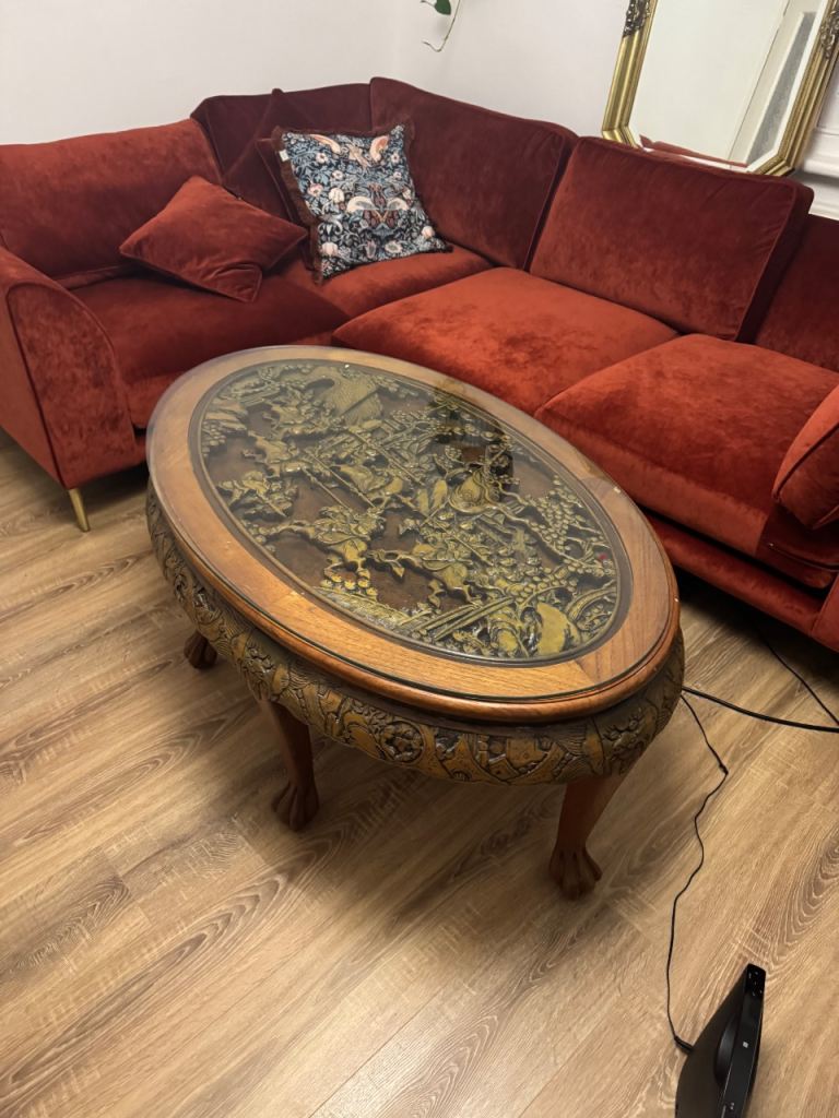 Antique Chinese carved oval coffee table