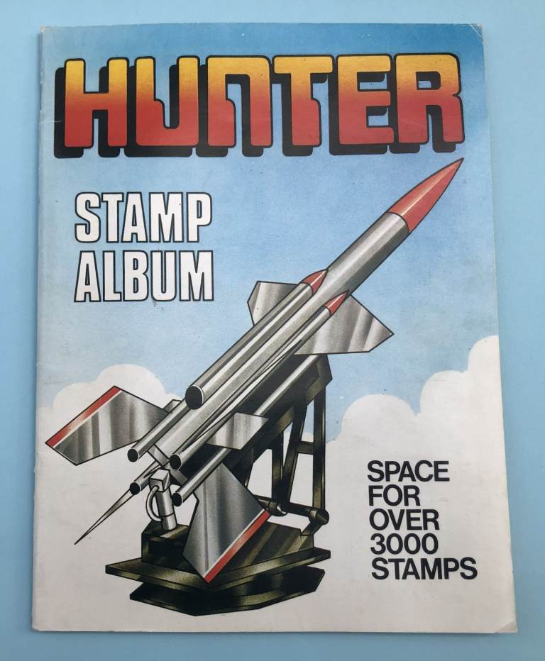 Vintage Hunter Stamp Album with collection of 135 world stamps