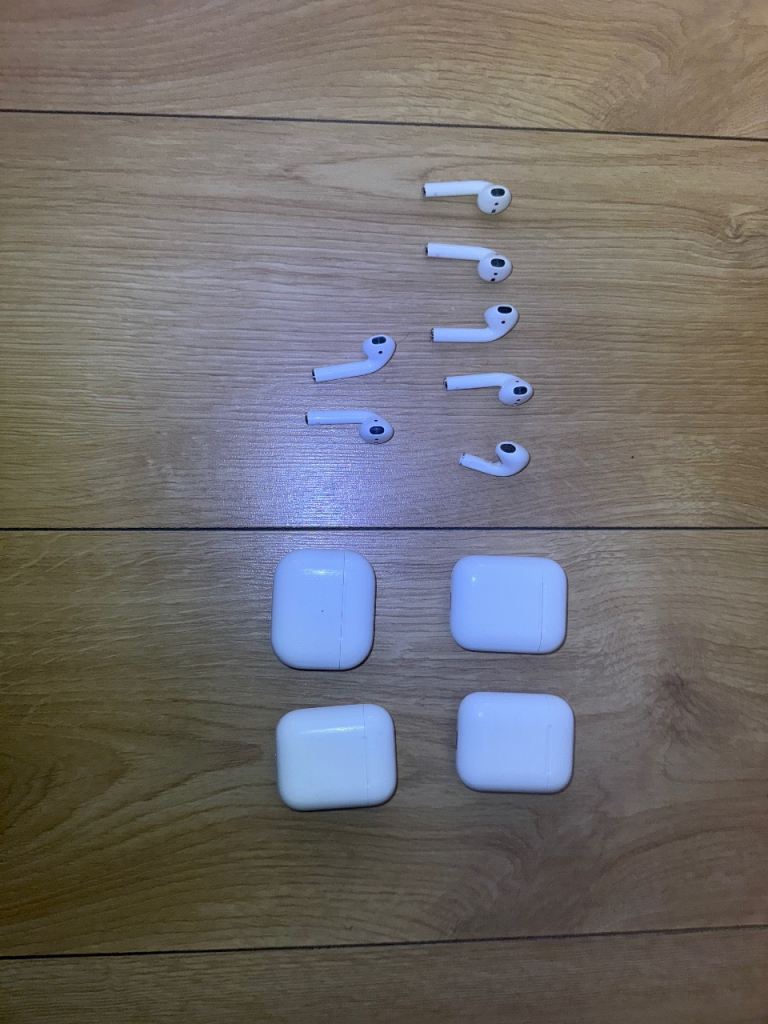 Apple AirPods Earbuds and Charging Cases – White