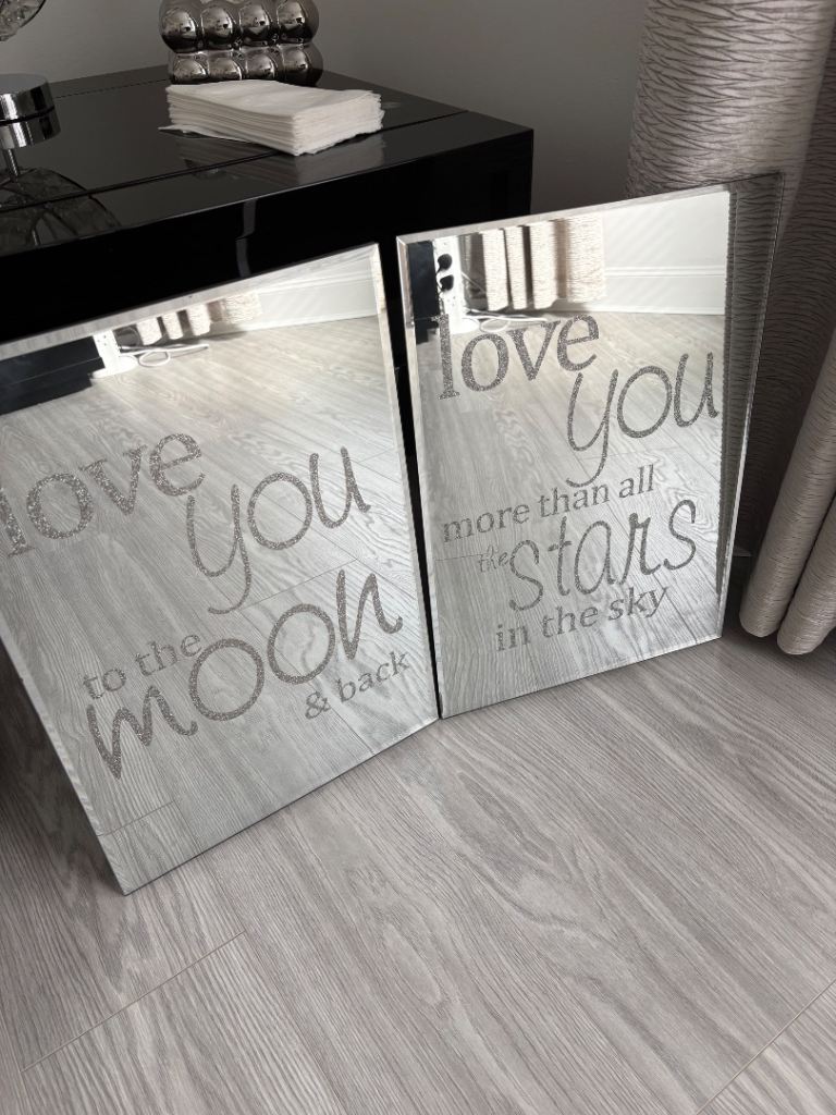 2 mirrors with writing 