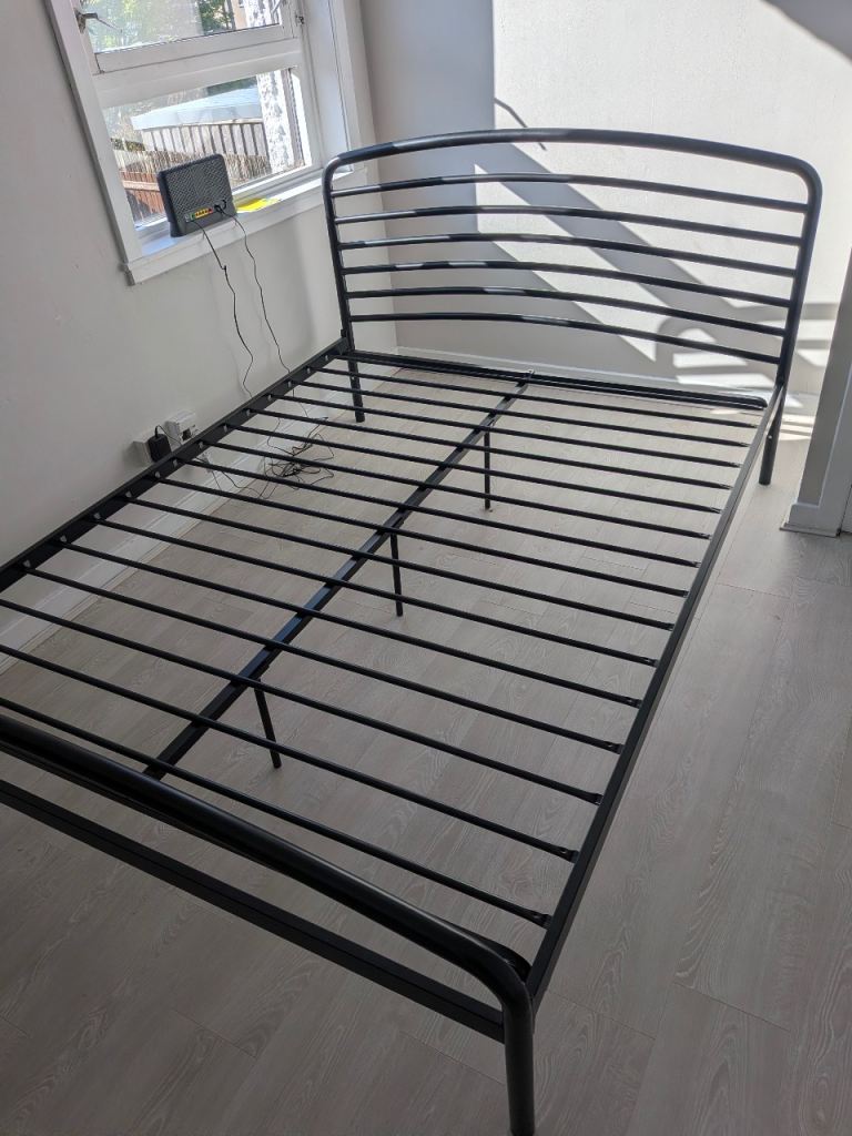 Black metal double bed frame