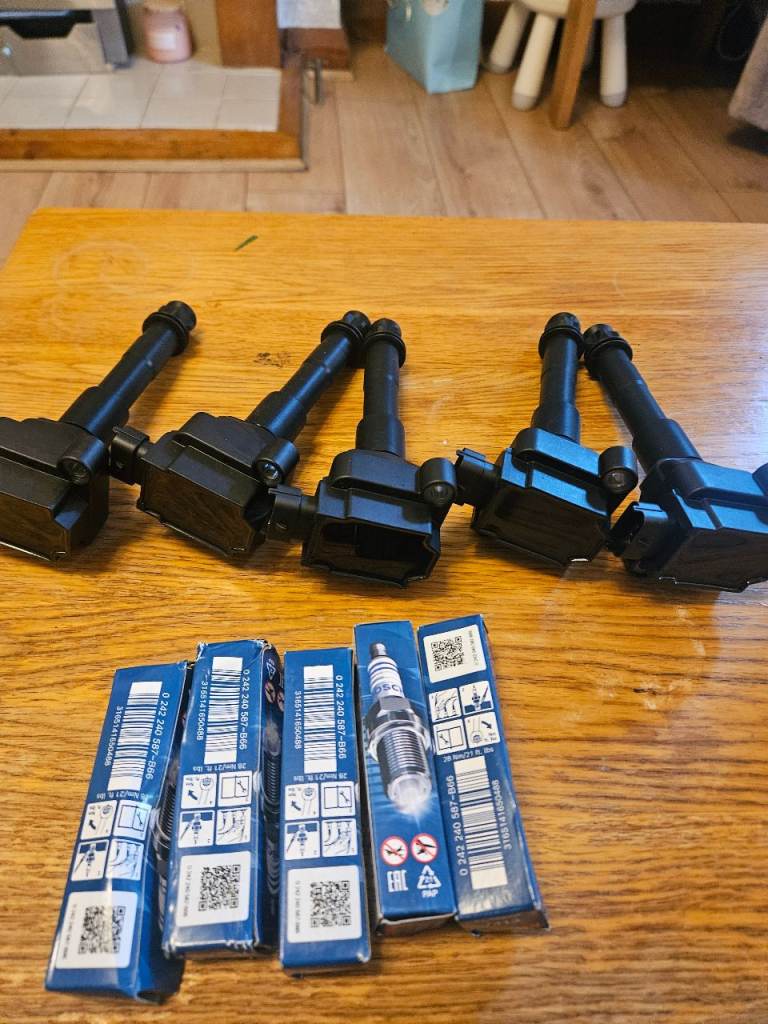 Porsche boxster coil packs and spark plugs 