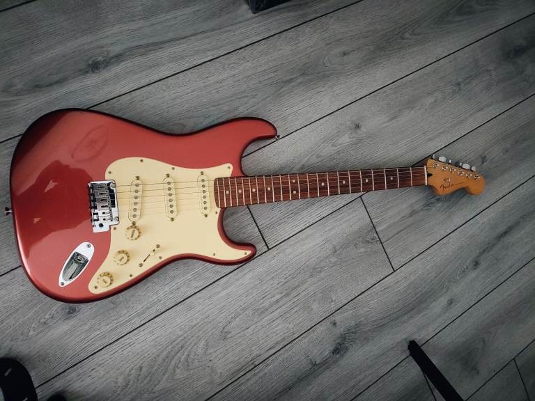 Fender player plus Stratocaster in aged candy apple red with optional tweed case extra 