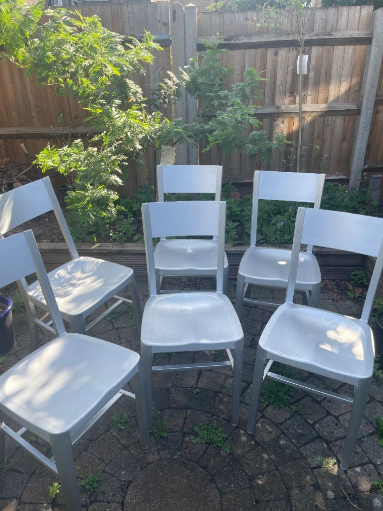 Six brushed aluminium industrial dining chairs 