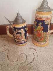 Pair of Vintage German Beer Steins with Pewter Lids – Good Condition