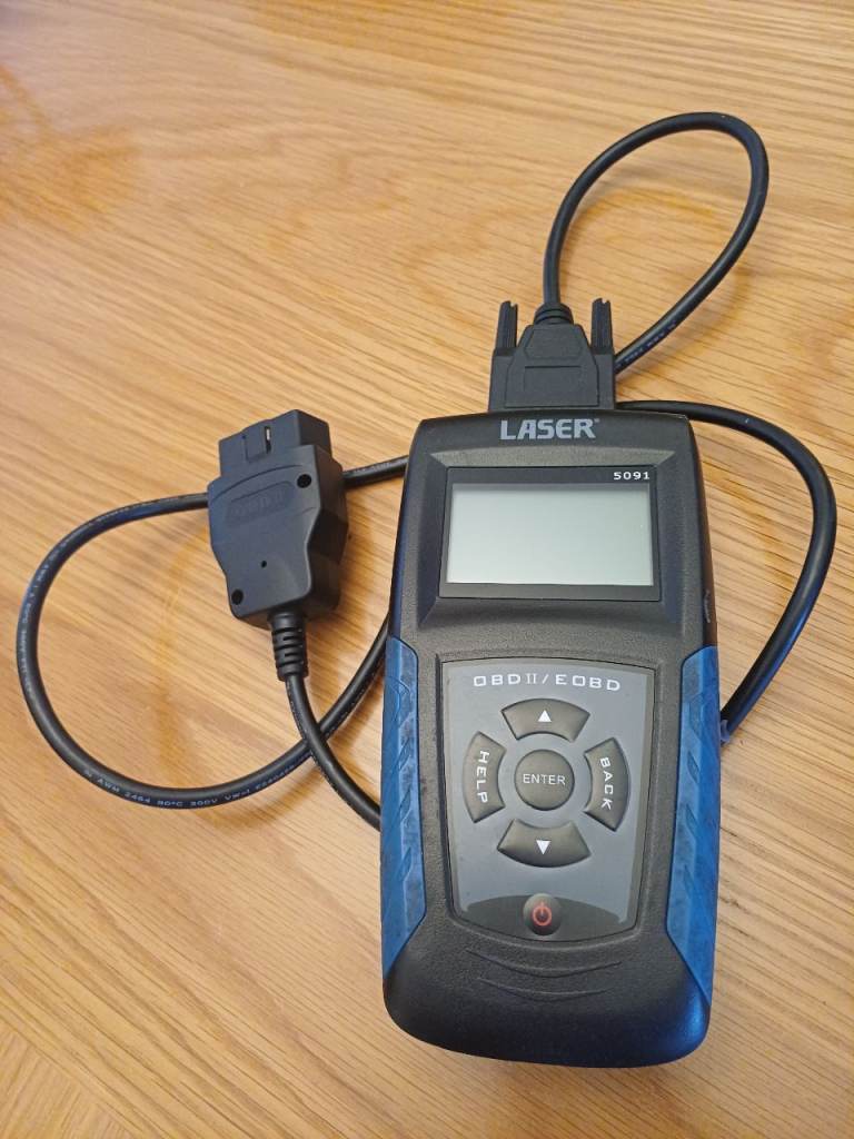Laser OBD11 car fault code reader.