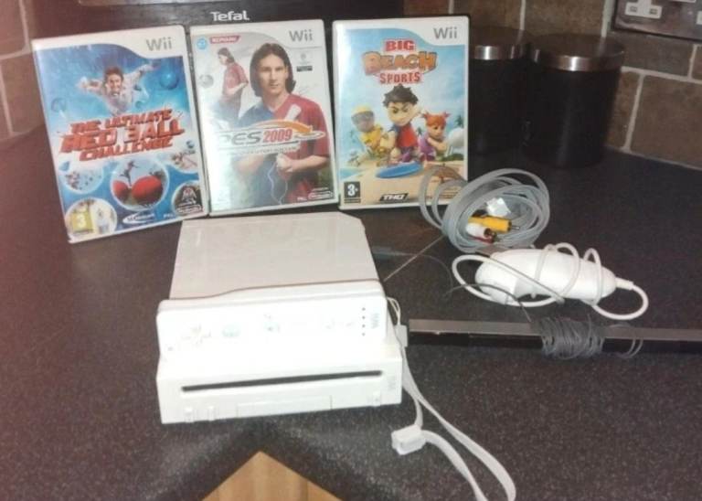 Nintendo Wii Console with 3 Games and Accessories – Good Condition