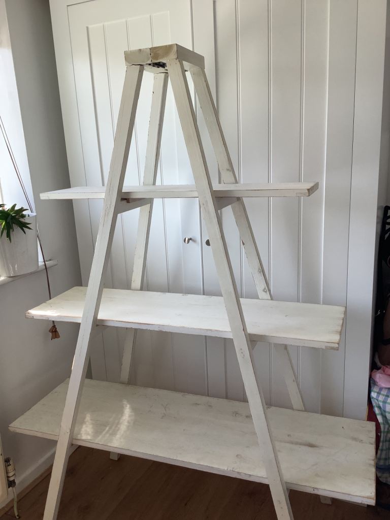 Distressed white wooden shelving unit. Easy to put up, dismantle. Solid wood,