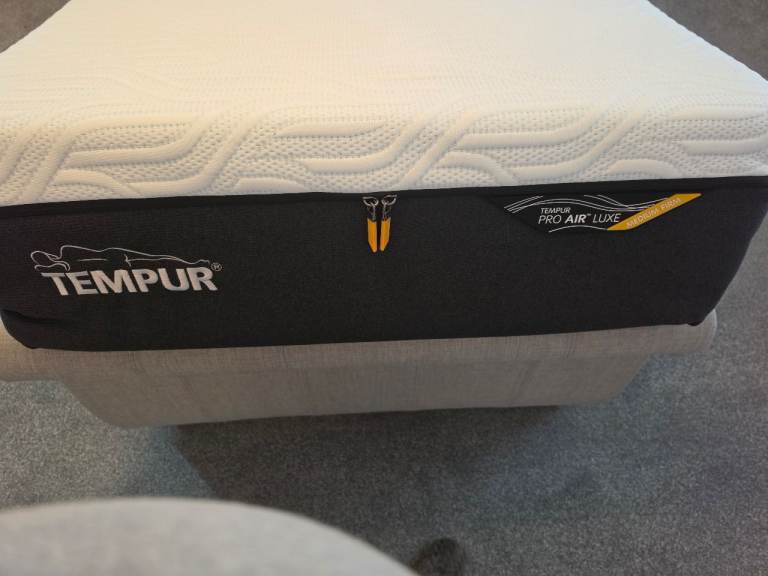 A Tempur 3ft single mattress and sleigh bedframe 