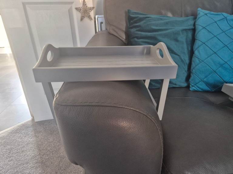 2 grey sofa trays